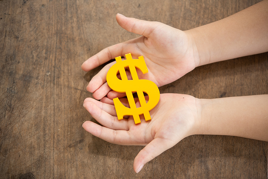 The yellow dollar symbol on hands children